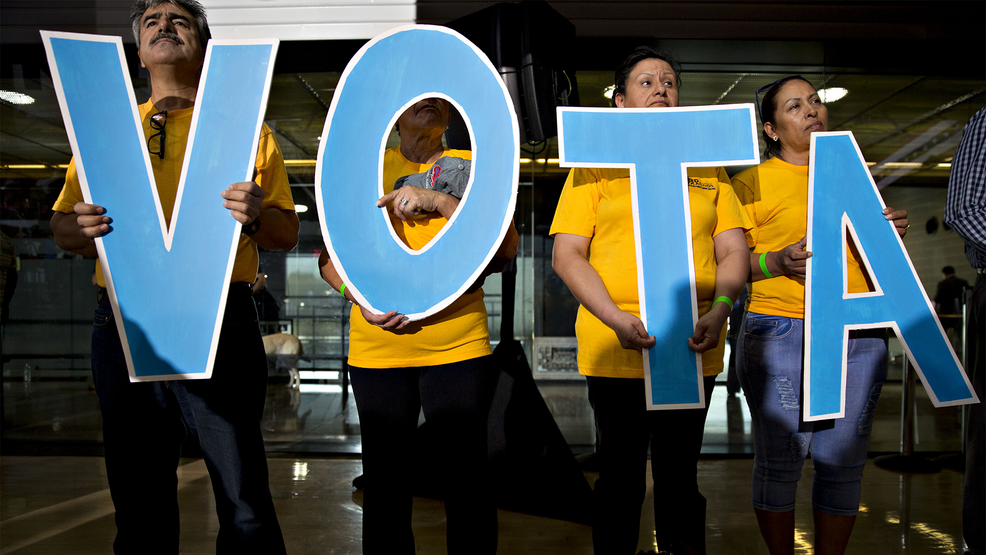 Color photo of adults attending a two thousand sixteen political campaign event in Phoenix, Arizona.