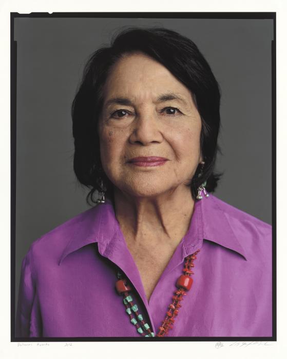 Portrait of Dolores Huerta in a pink shirt