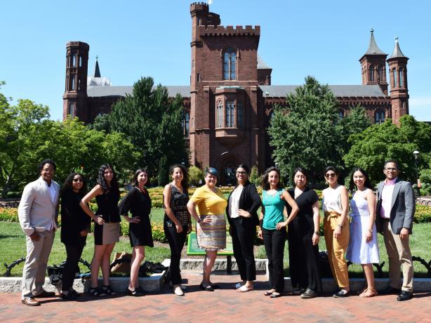 Graduate fellows in front of the Smithsonian Castle