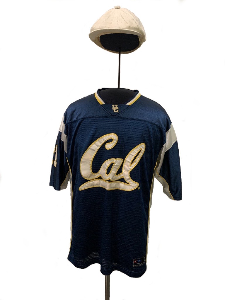 L2-0002213-D1-2023.05.22 Blue and gold University of California Berkely Football jersey and white cap